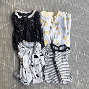 Four newborn onesies